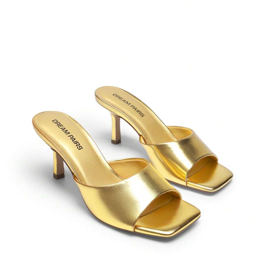 Pair of women's open square toe kitten heel mule sandals in white PU leather with slip-on styling.