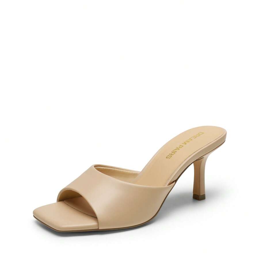 Pair of women's open square toe kitten heel mule sandals in white PU leather with slip-on styling.