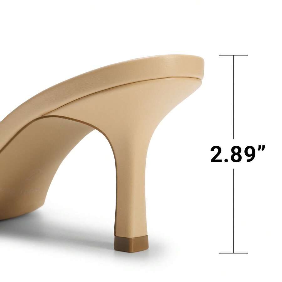 Pair of women's open square toe kitten heel mule sandals in white PU leather with slip-on styling.