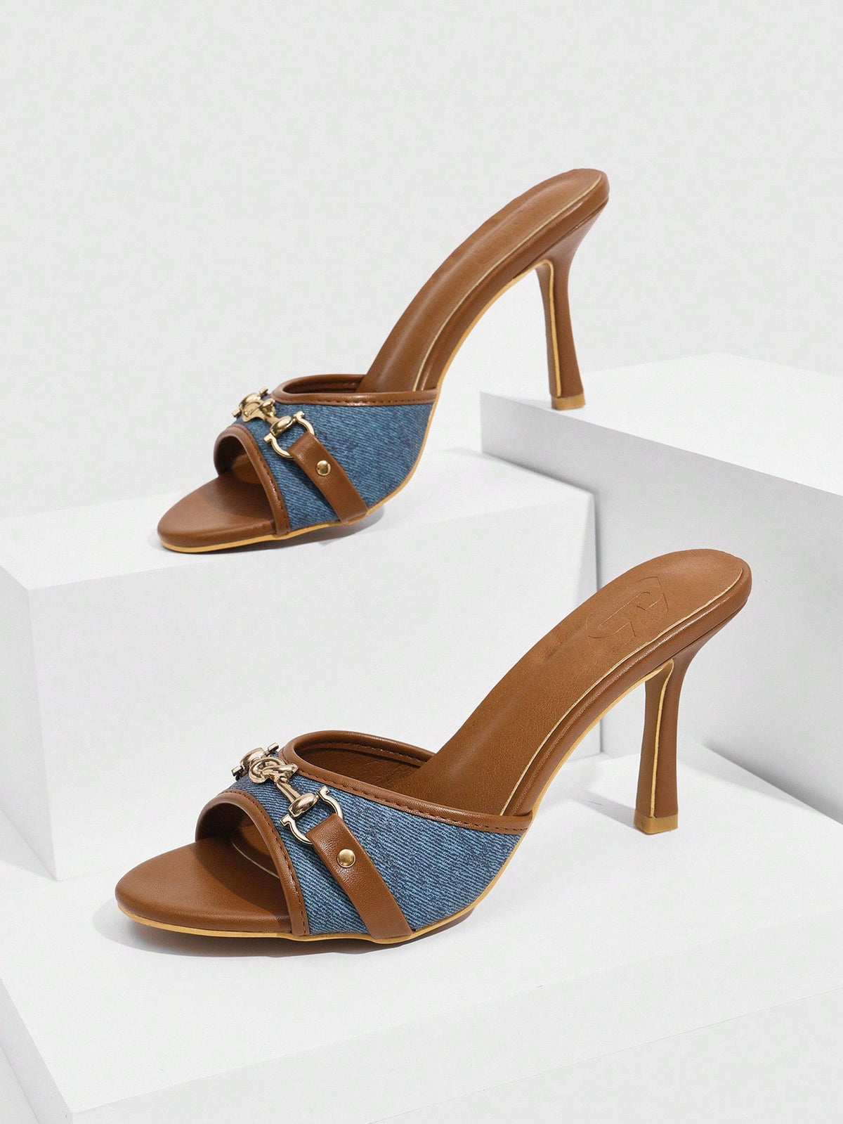 Women's beige high heel mule sandals with open round toe and metal chain detail
