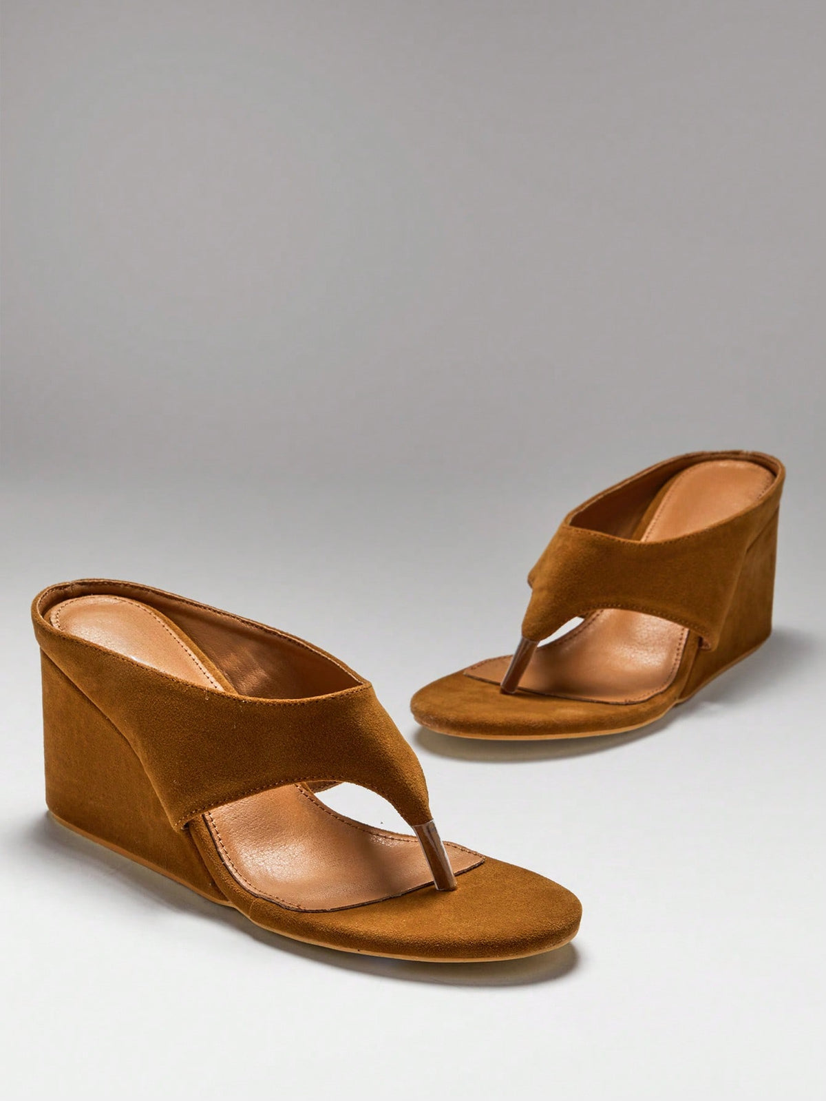 Women's slip-on thong wedge sandals with high heels and open toe design