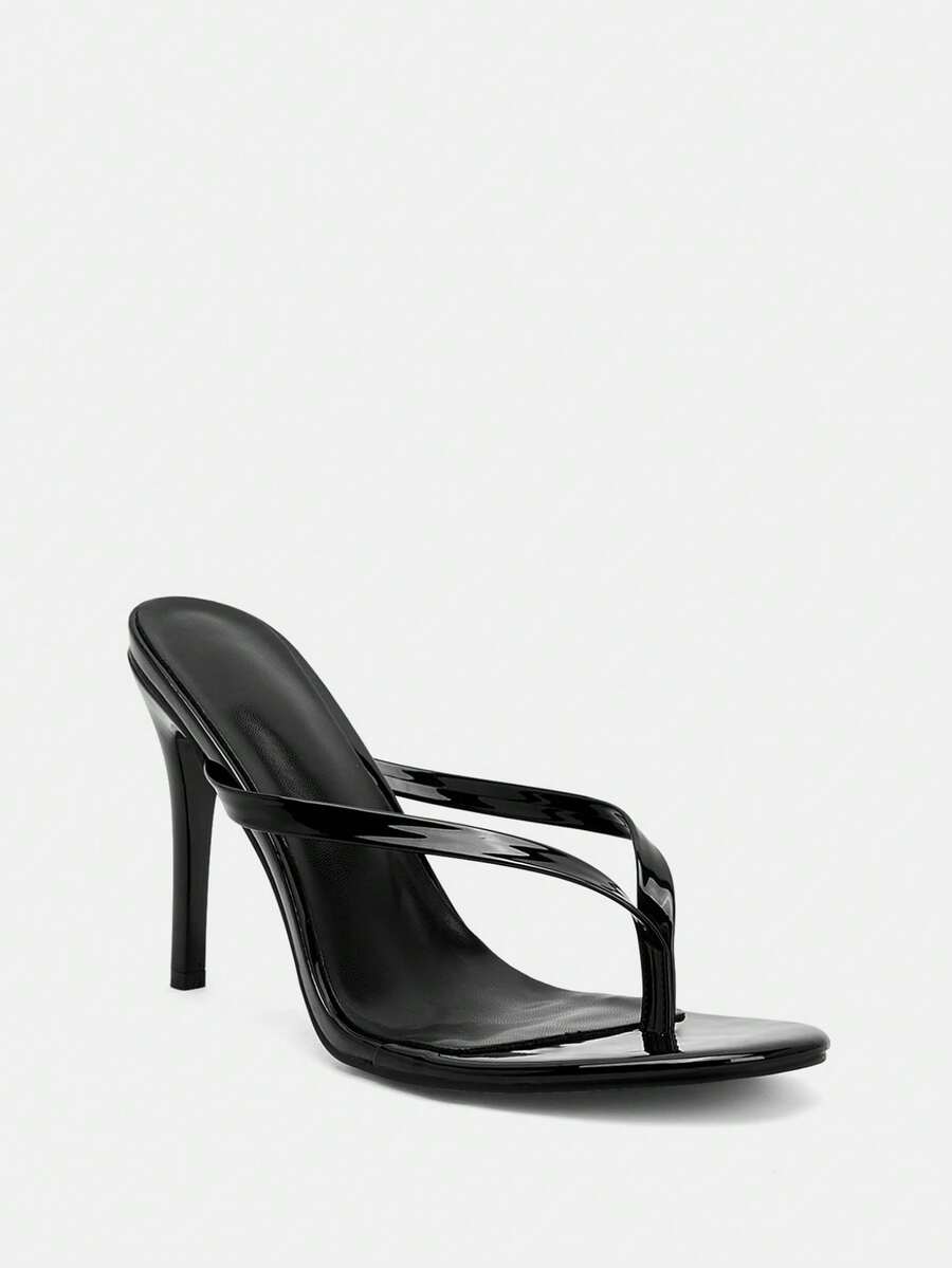 Women's black high heel thong sandals with stiletto heel and open round toe design.