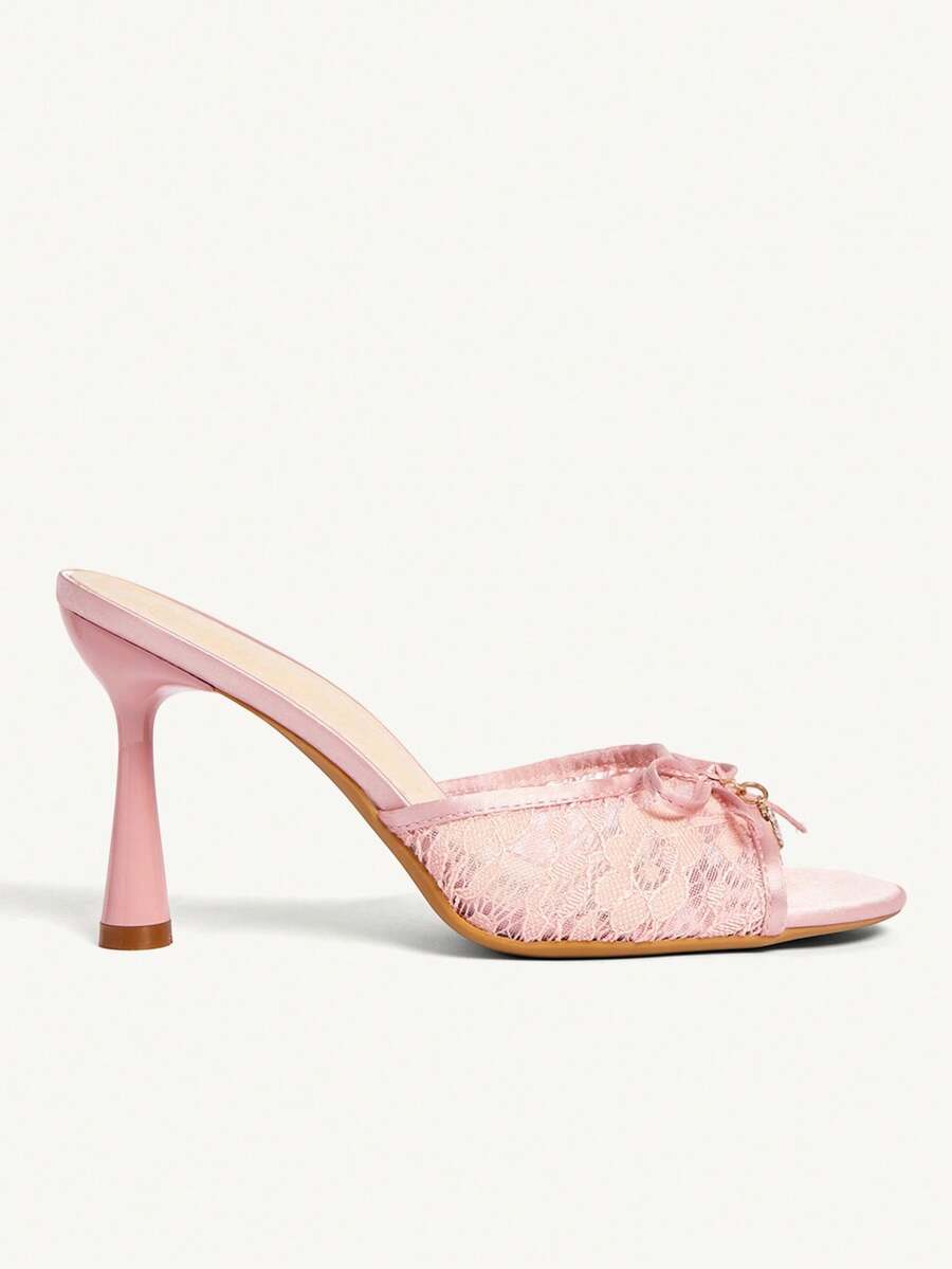 Elegant women's pointed toe high heel mules crafted from smooth PU leather with stiletto heels and delicate bow detail.