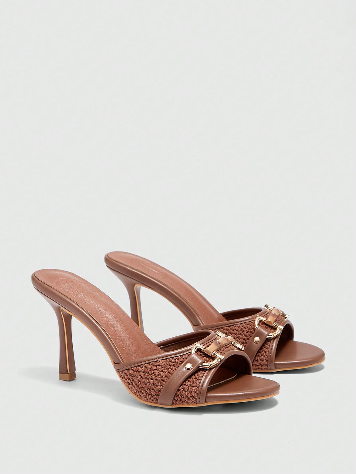 Women's beige high heel mule sandals with open round toe and metal chain detail