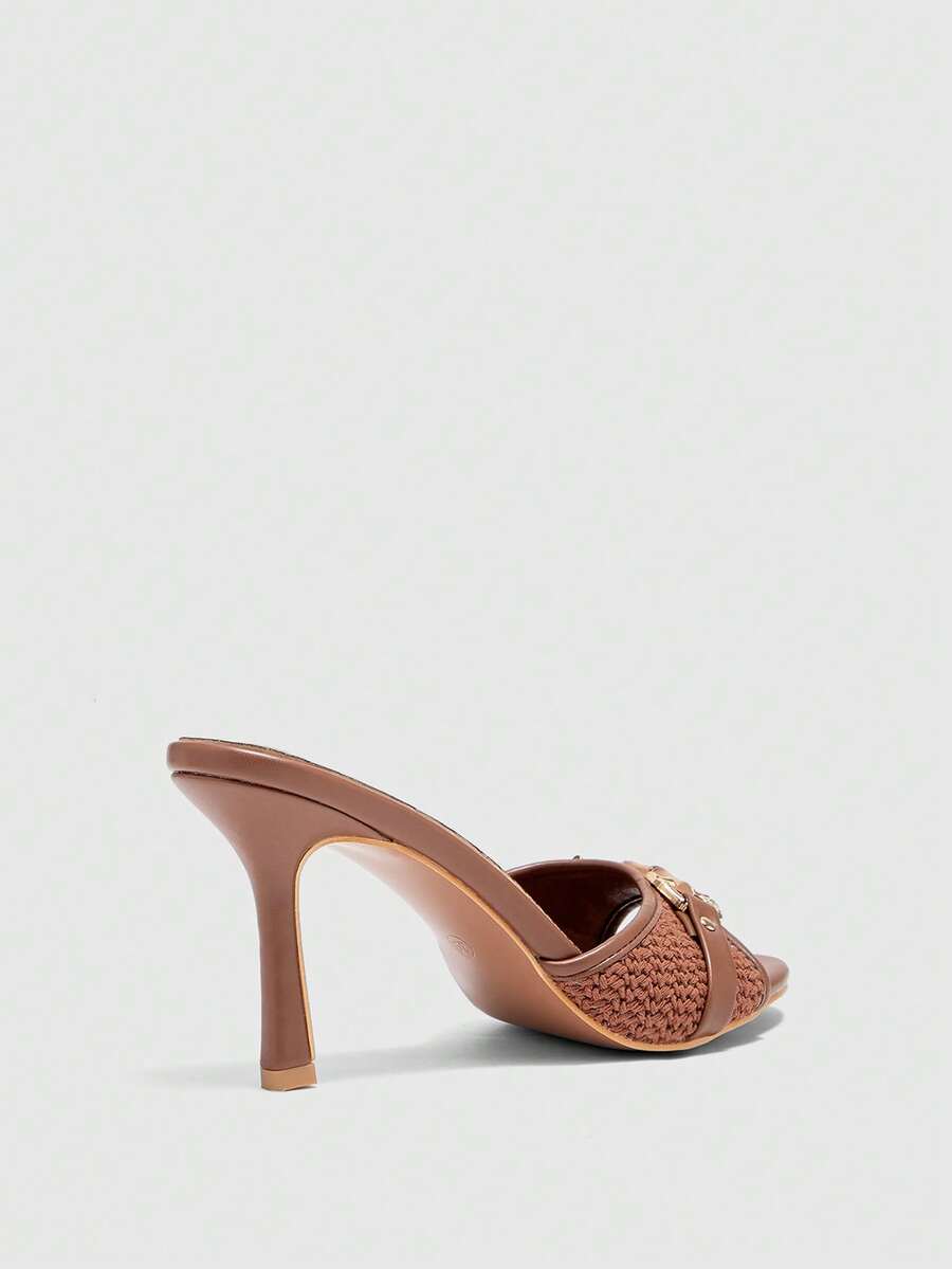 Women's beige high heel mule sandals with open round toe and metal chain detail