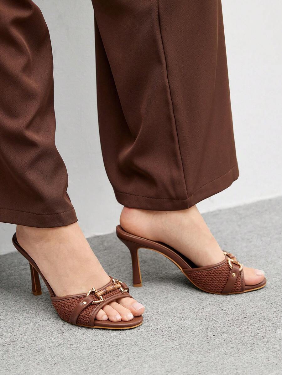 Women's beige high heel mule sandals with open round toe and metal chain detail