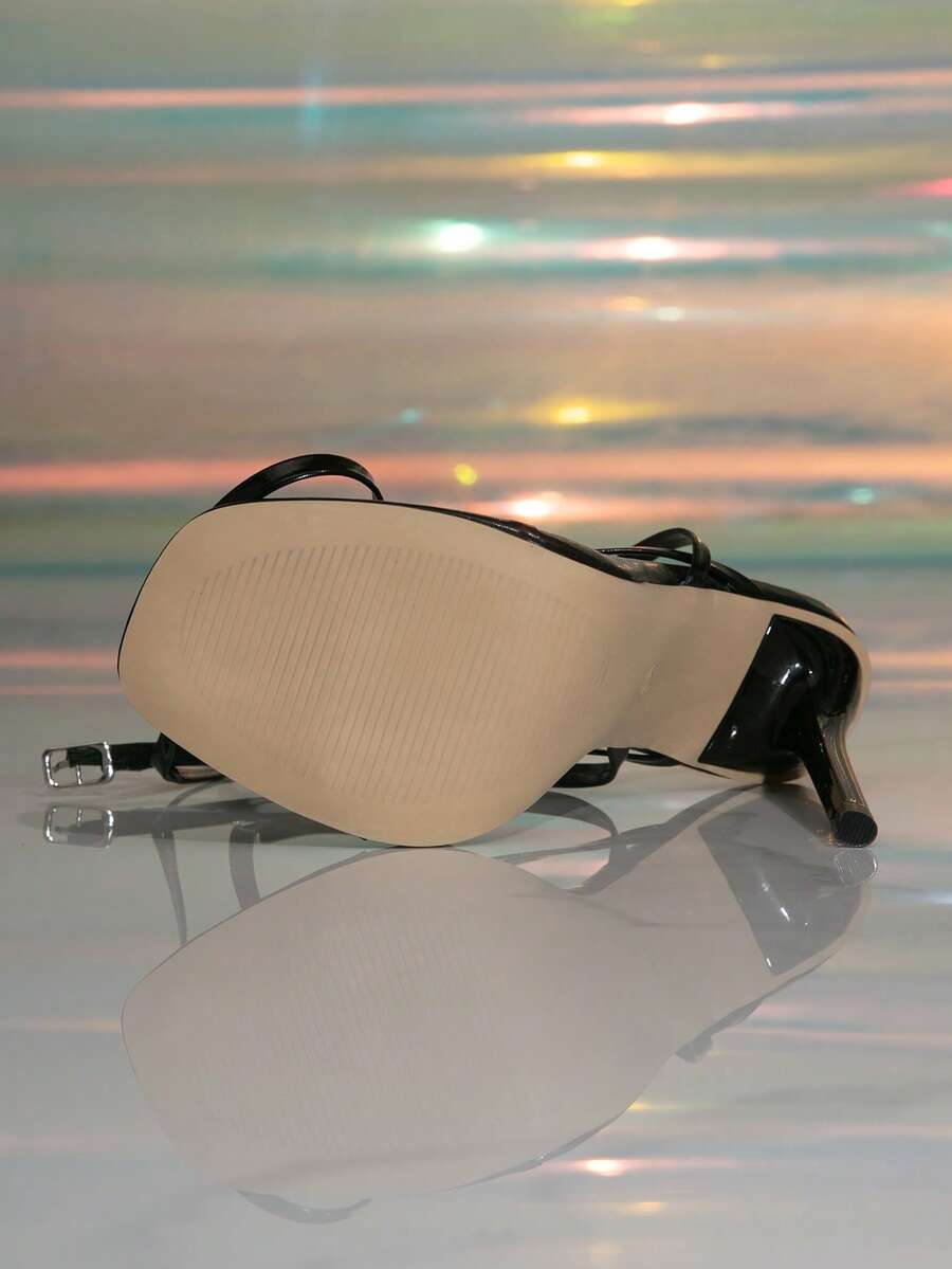 Women's stiletto high heel thong sandals featuring a T-strap toe loop design and ankle buckle strap