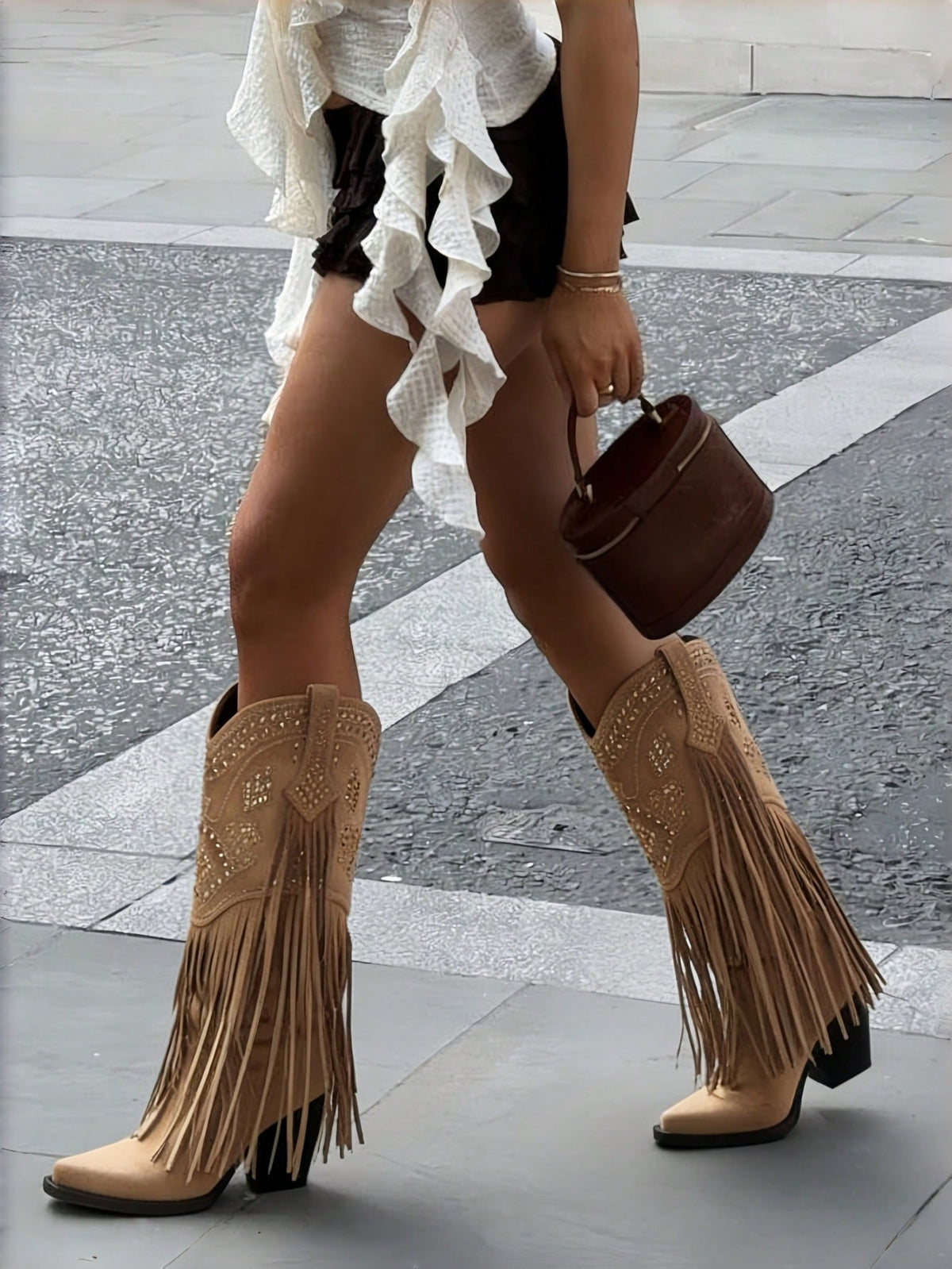 Women's camel suedette knee high western cowgirl boots featuring sparkling rhinestone fringe accents, a pointed toe, and a chunky block heel.