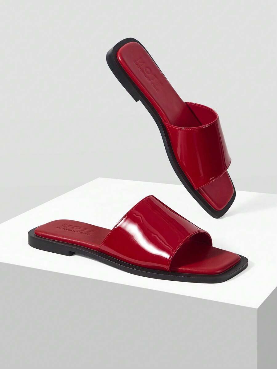 Retro women's square toe open toe flat slippers featuring a smooth PU leather finish and lightweight slip-on design.