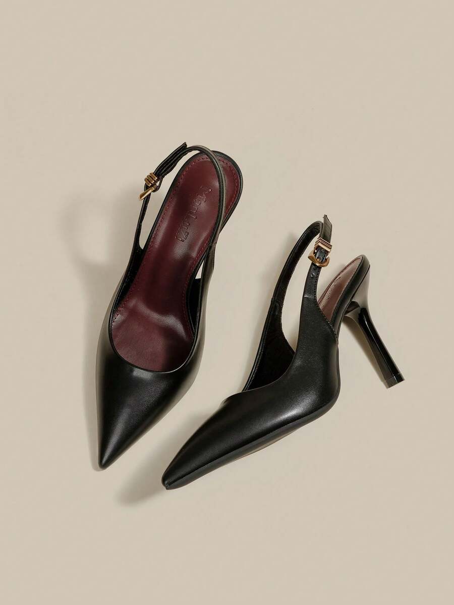 Women's pointed toe kitten heel pumps with adjustable buckle back strap and sleek patent finish.