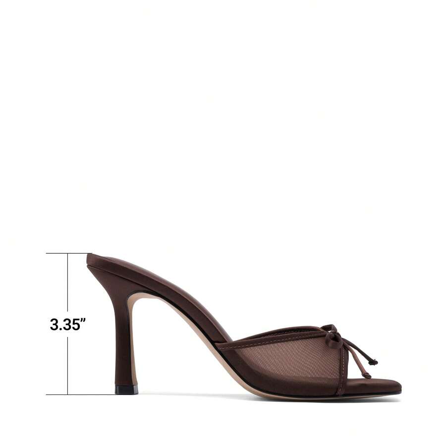 Women's open toe stiletto mule sandals featuring a breathable mesh upper with a decorative bow and square toe design.