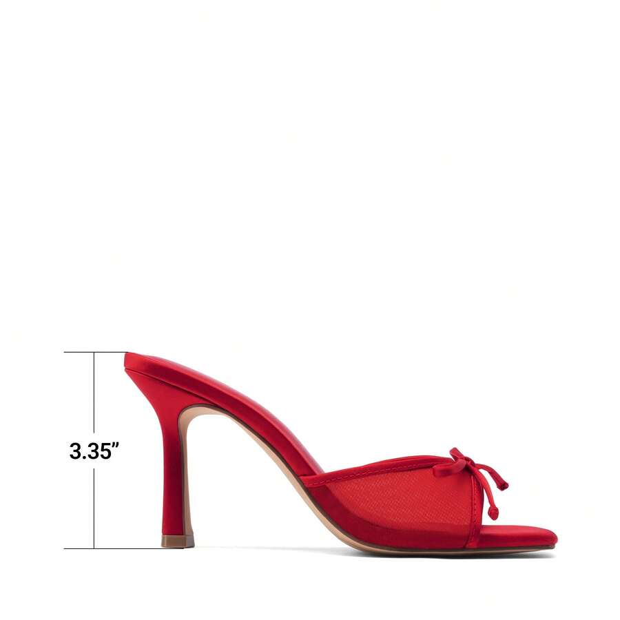 Women's open toe stiletto mule sandals featuring a breathable mesh upper with a decorative bow and square toe design.