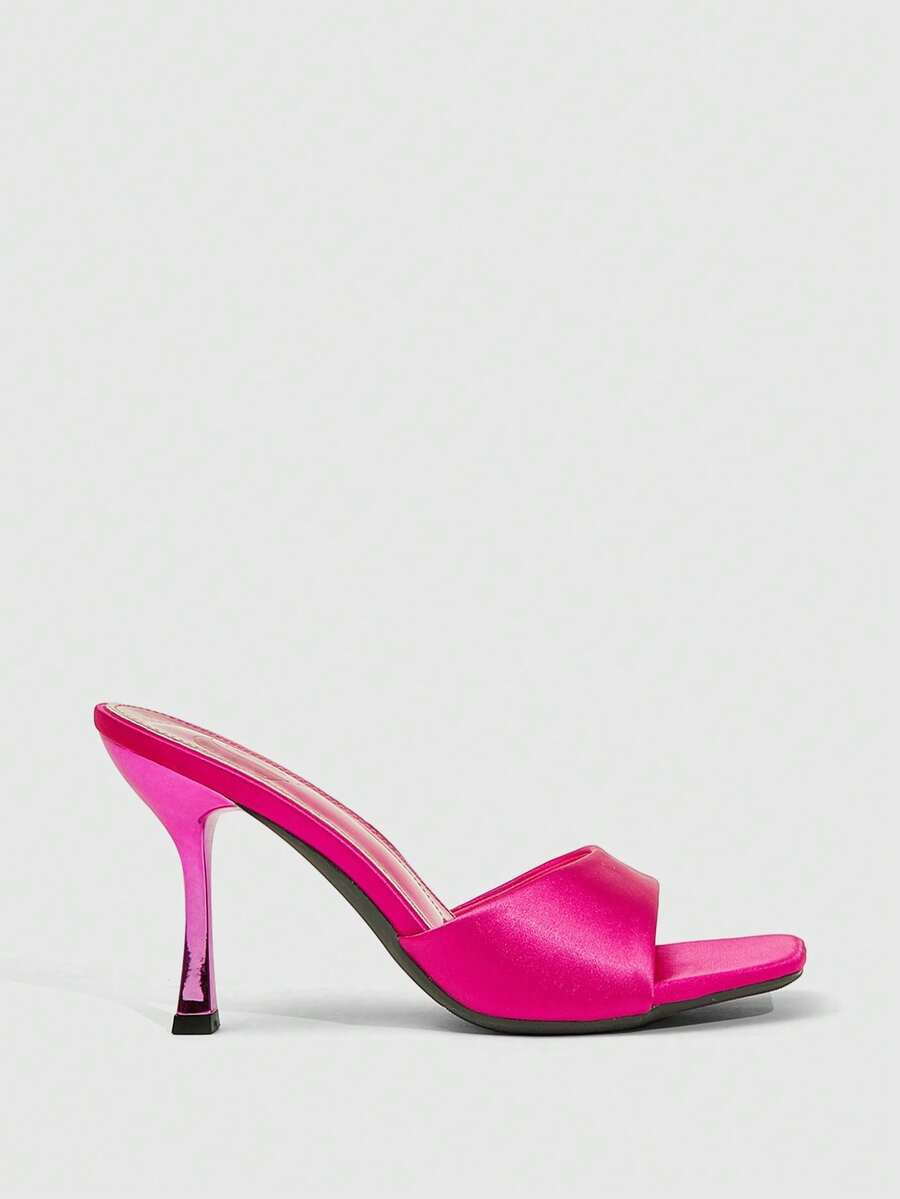 Women's open square toe slender high heel sandals with slingback strap and metal buckle detailing.