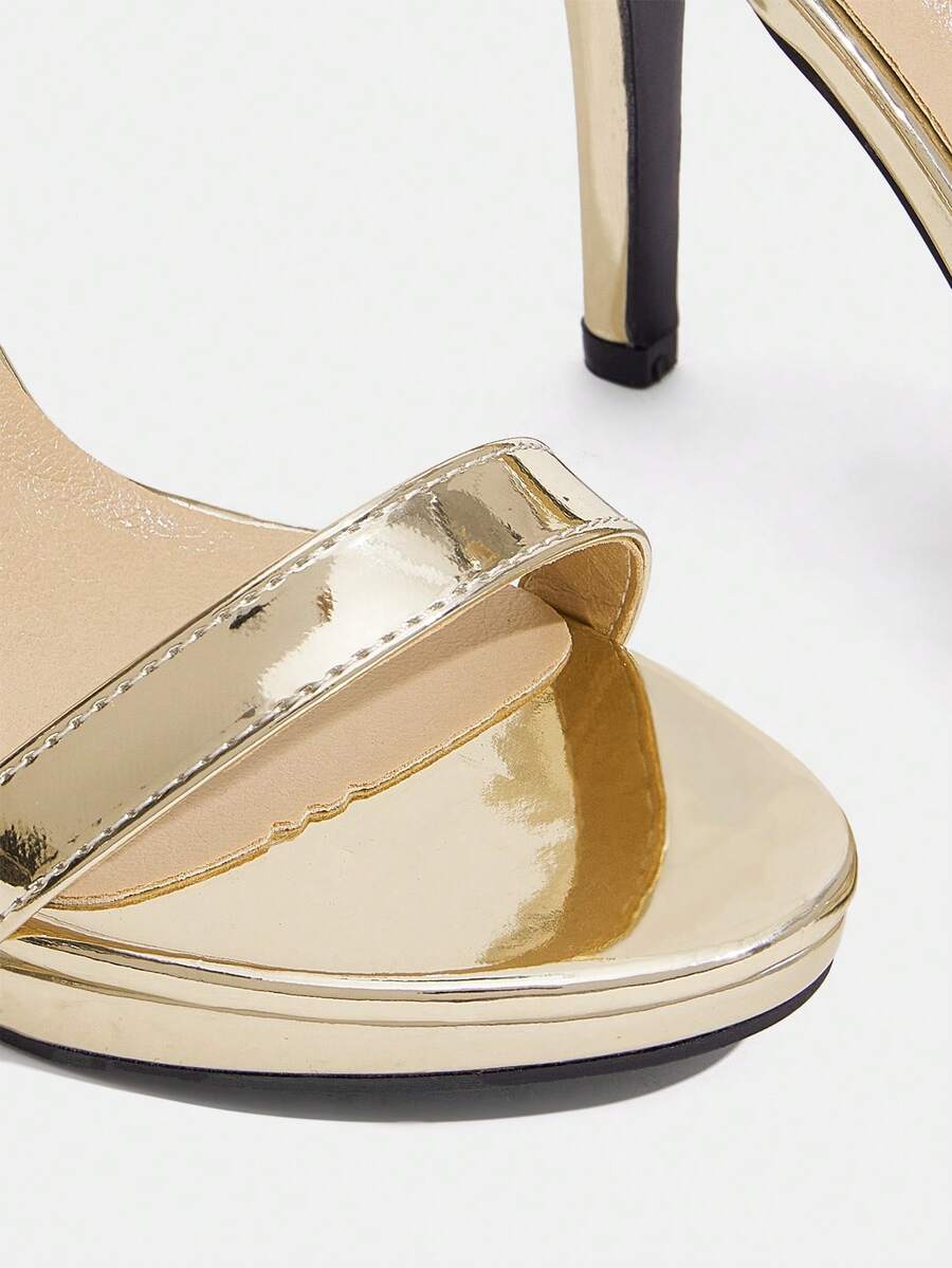 Women's open toe stiletto heeled sandals with ankle strap buckle closure