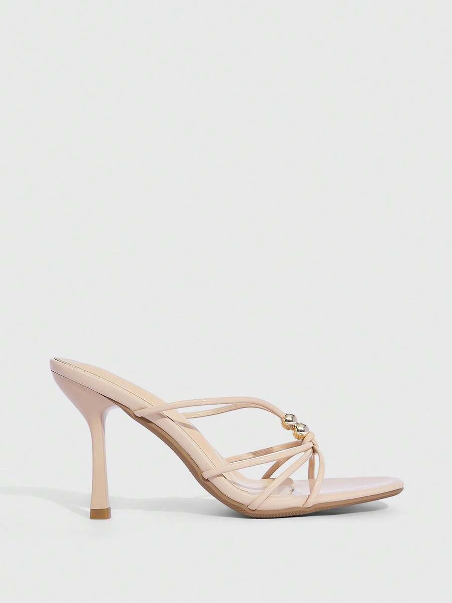 Burgundy stiletto high heel sandals featuring open toe thin straps and knot details