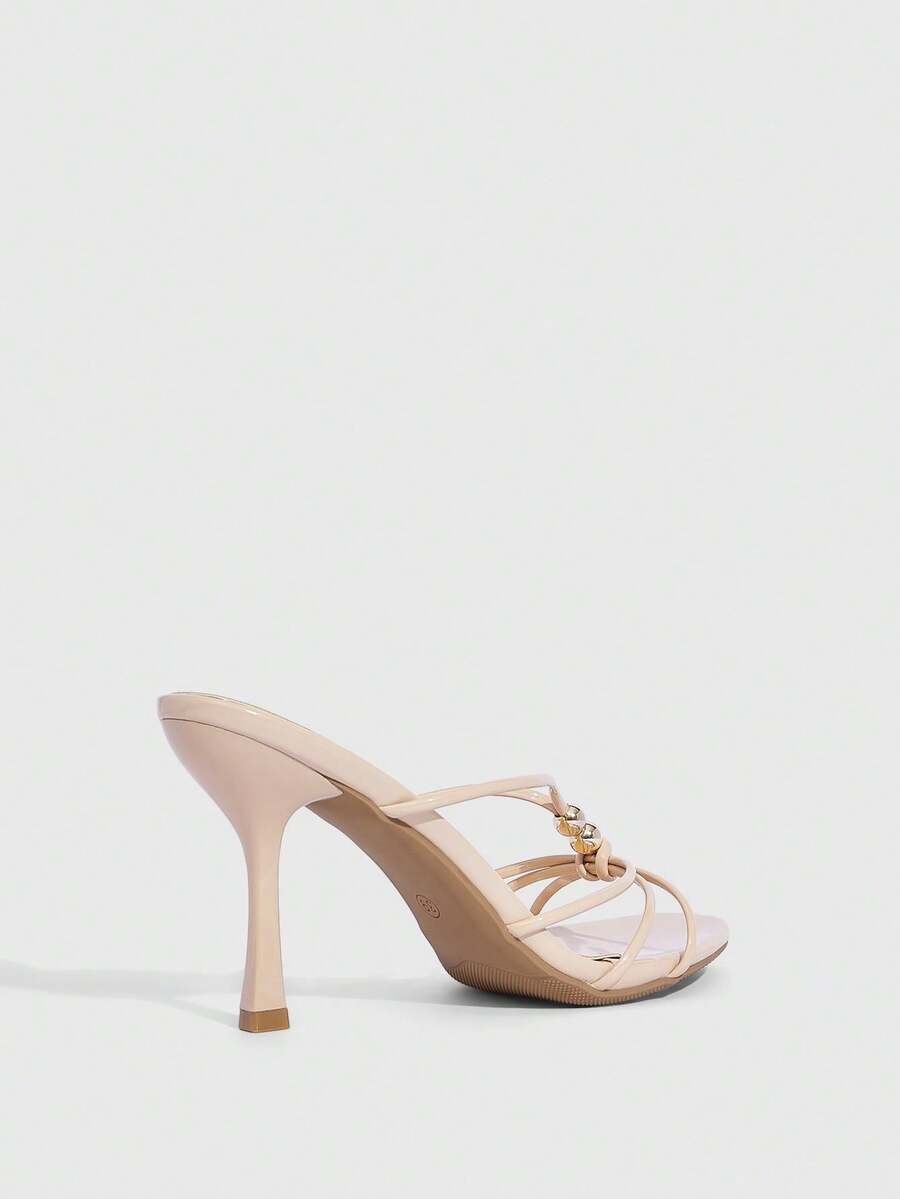 Burgundy stiletto high heel sandals featuring open toe thin straps and knot details