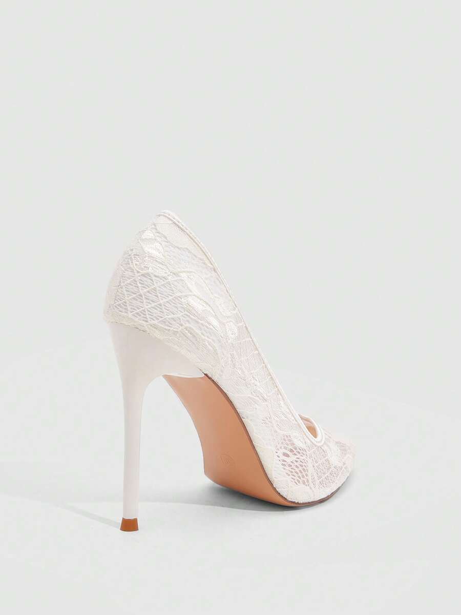 Women's pointed clear lace heels with contrast mesh, floral embroidery, and stiletto high heel with buckle strap.