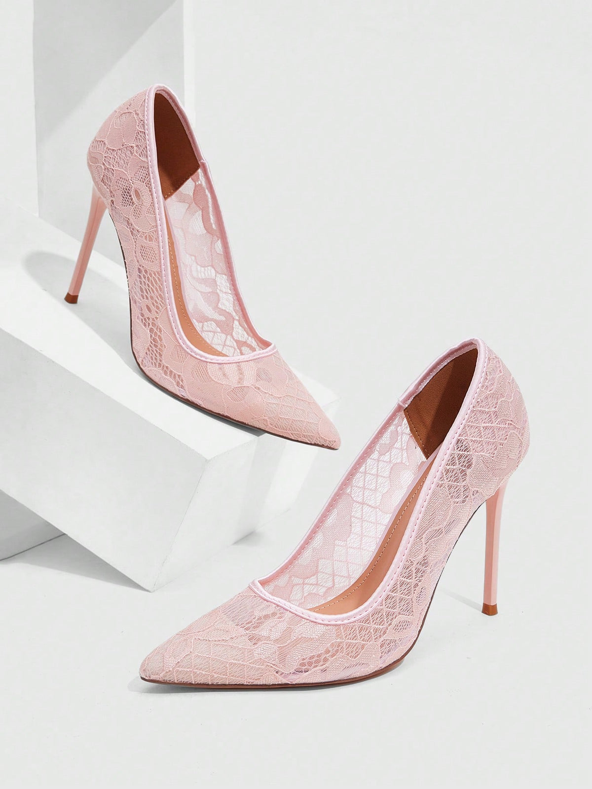 Women's pointed clear lace heels with contrast mesh, floral embroidery, and stiletto high heel with buckle strap.
