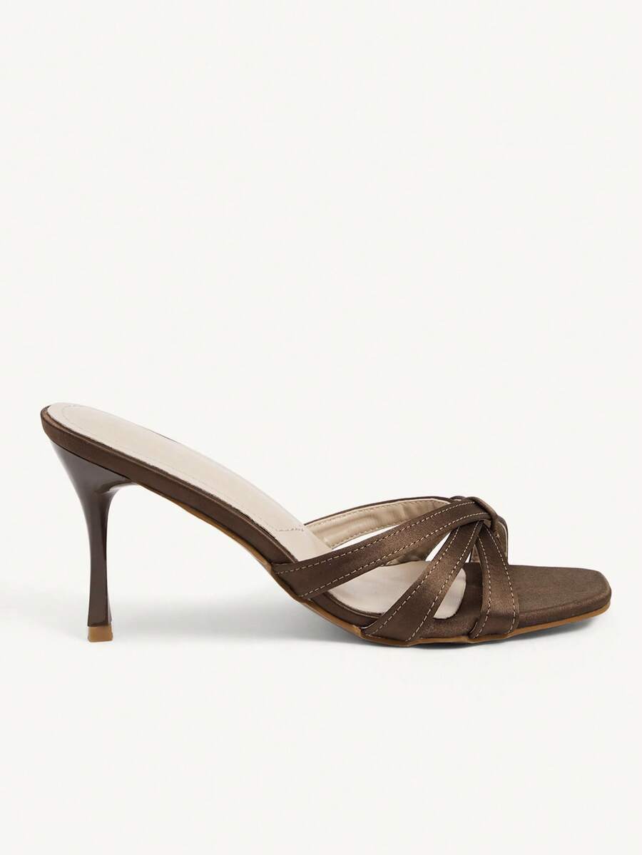 Square toe gold metallic heel sandals for women featuring open toe, crossover slingback strap, and stiletto mid heel for weddings and parties.