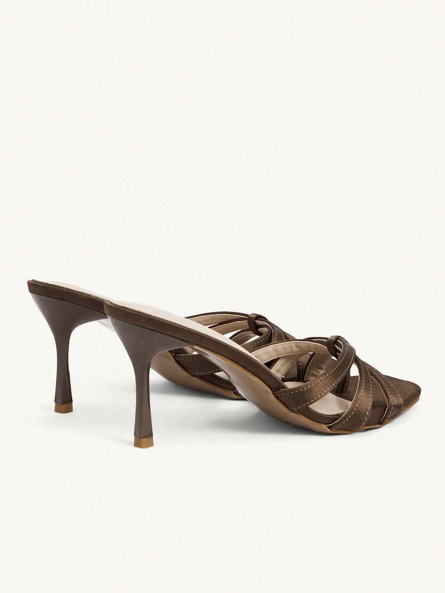 Square toe gold metallic heel sandals for women featuring open toe, crossover slingback strap, and stiletto mid heel for weddings and parties.