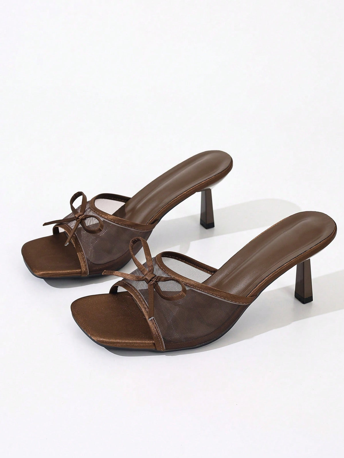 Women's black open toe mesh slide sandals with bowknot detail and stiletto heels