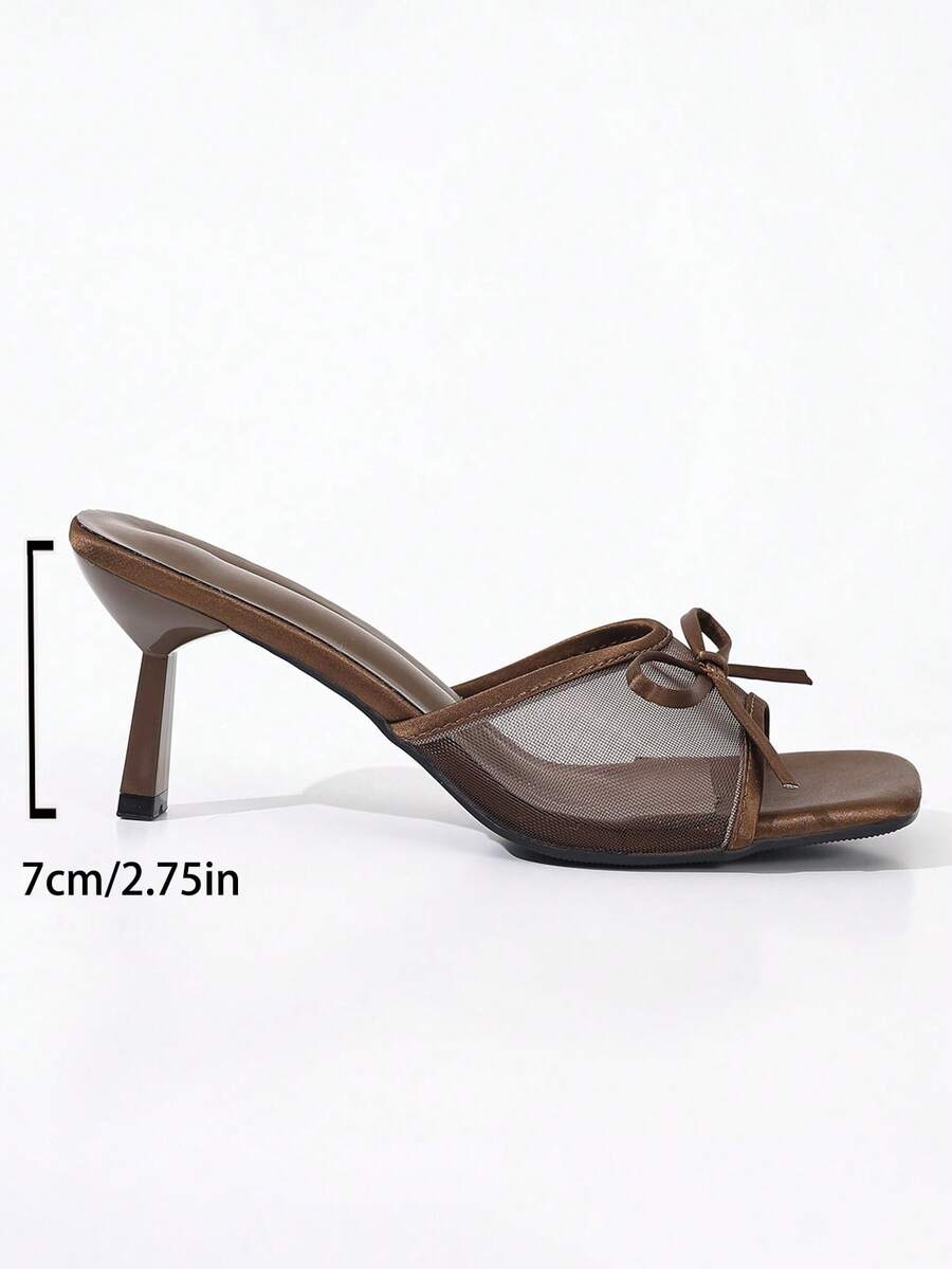 Women's black open toe mesh slide sandals with bowknot detail and stiletto heels