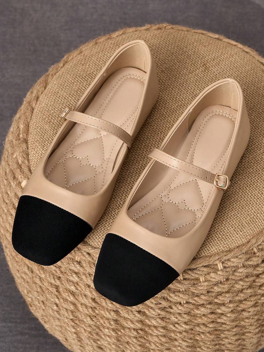 Pair of women's square toe slip-on flat shoes featuring a delicate bow detail and low vamp design.