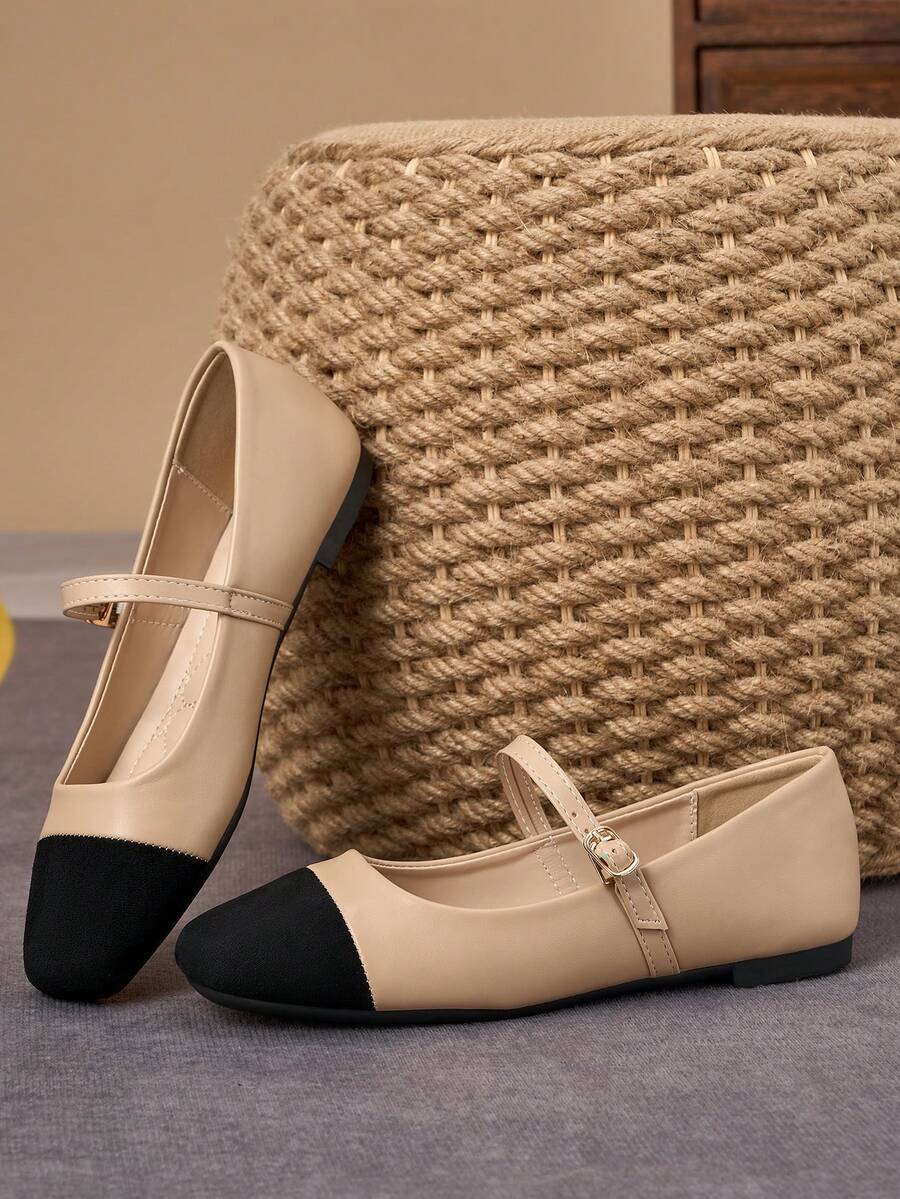 Pair of women's square toe slip-on flat shoes featuring a delicate bow detail and low vamp design.