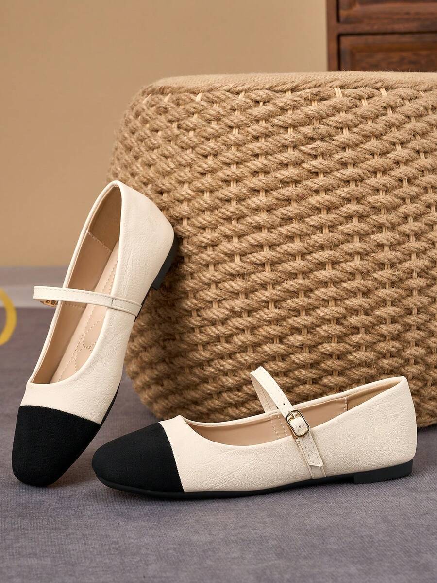 Pair of women's square toe slip-on flat shoes featuring a delicate bow detail and low vamp design.