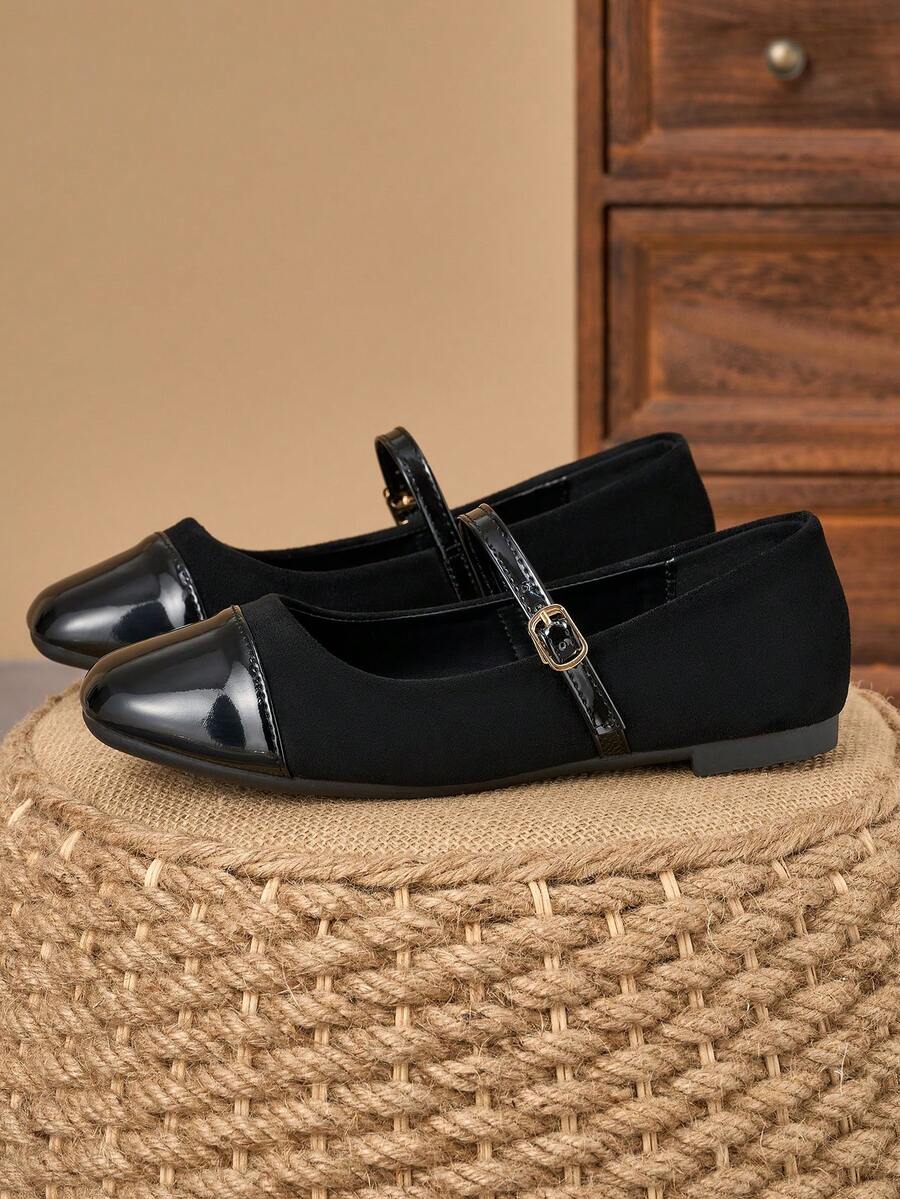 Pair of women's square toe slip-on flat shoes featuring a delicate bow detail and low vamp design.