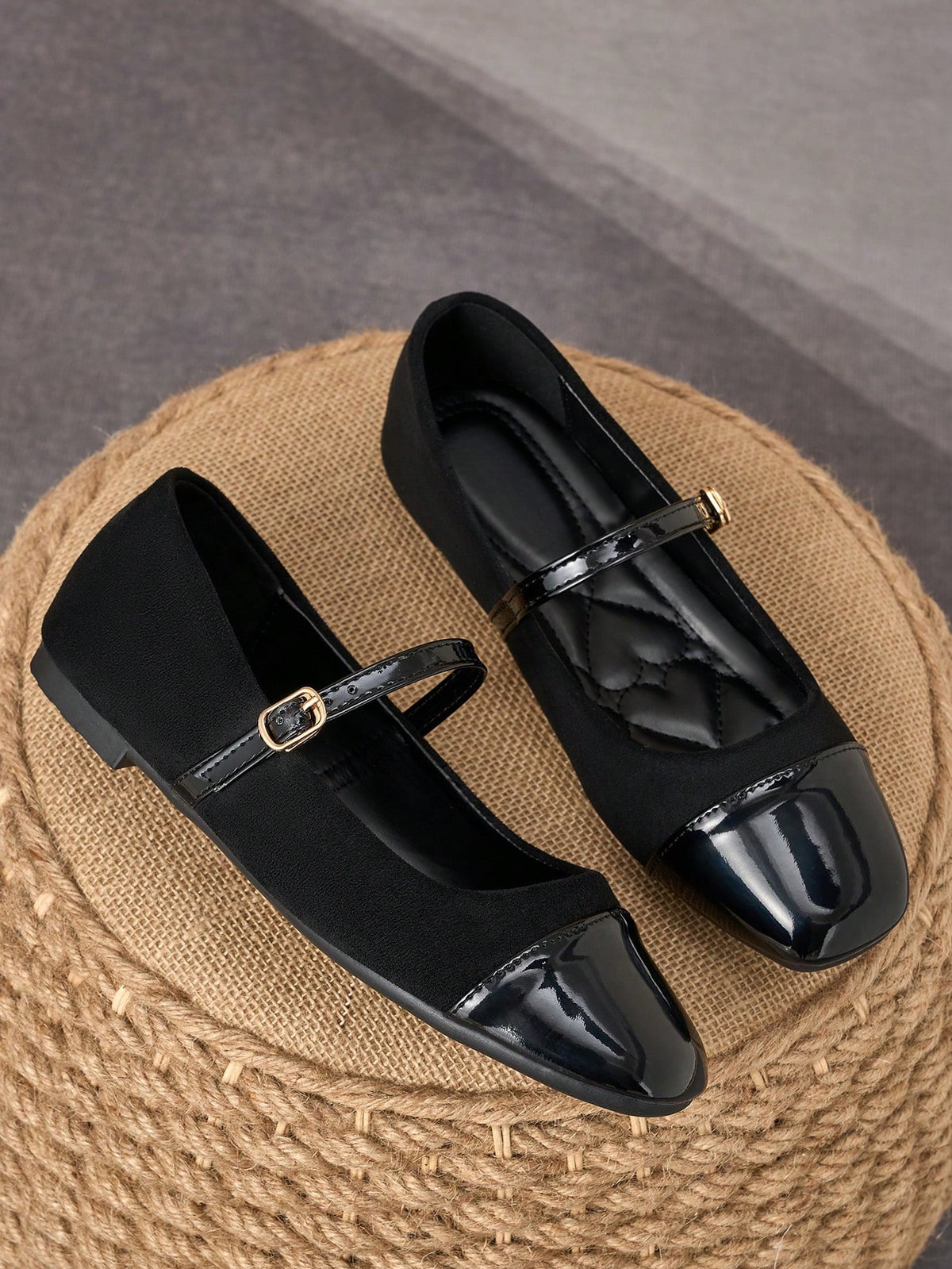 Pair of women's square toe slip-on flat shoes featuring a delicate bow detail and low vamp design.