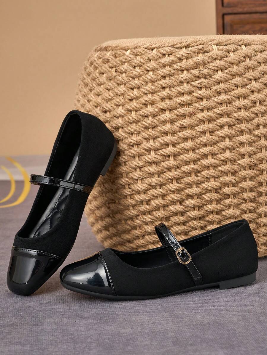 Pair of women's square toe slip-on flat shoes featuring a delicate bow detail and low vamp design.