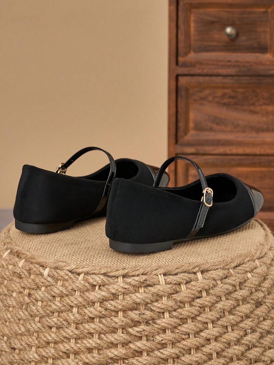 Pair of women's square toe slip-on flat shoes featuring a delicate bow detail and low vamp design.