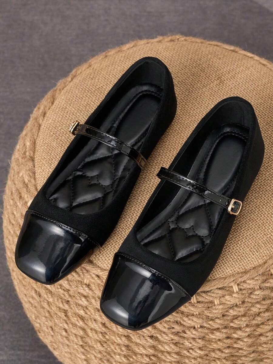 Pair of women's square toe slip-on flat shoes featuring a delicate bow detail and low vamp design.