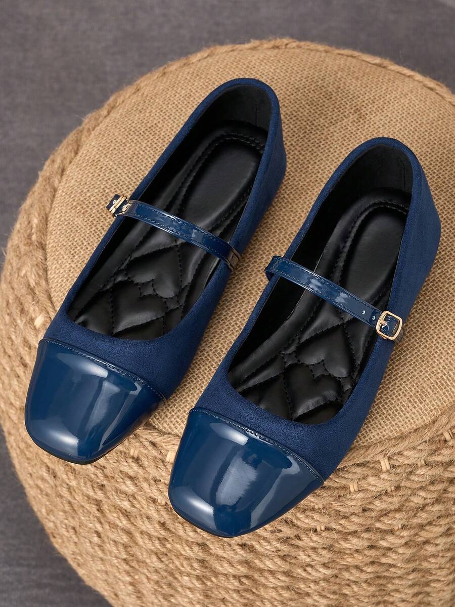 Pair of women's square toe slip-on flat shoes featuring a delicate bow detail and low vamp design.