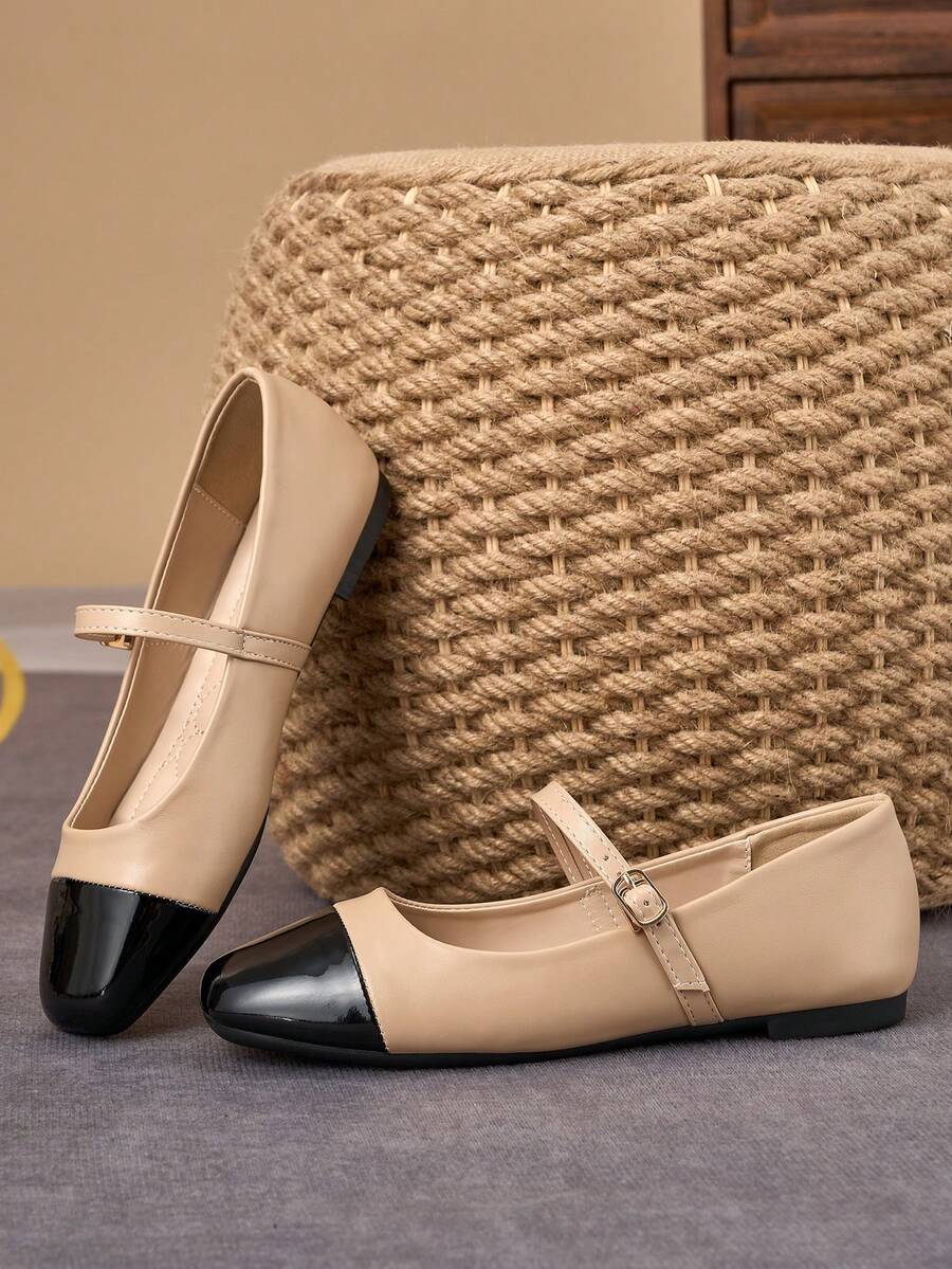 Pair of women's square toe slip-on flat shoes featuring a delicate bow detail and low vamp design.
