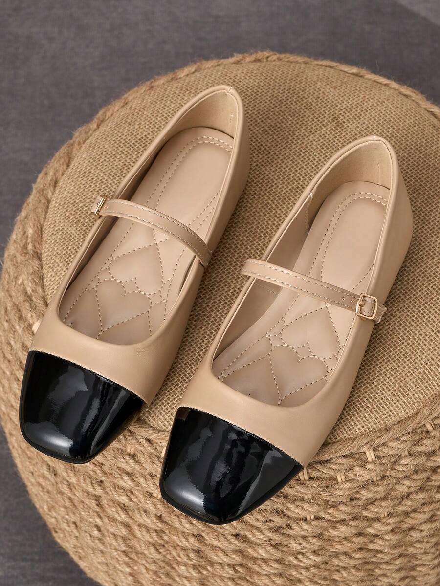 Pair of women's square toe slip-on flat shoes featuring a delicate bow detail and low vamp design.