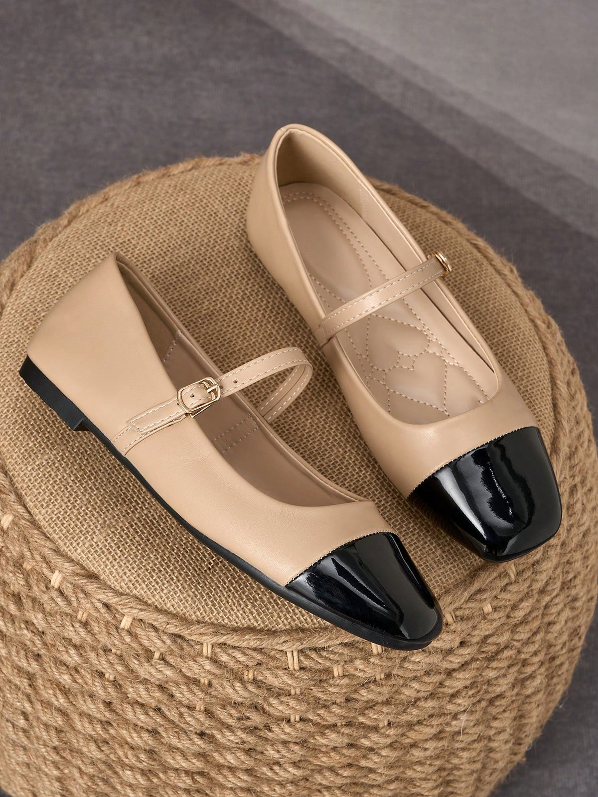 Pair of women's square toe slip-on flat shoes featuring a delicate bow detail and low vamp design.