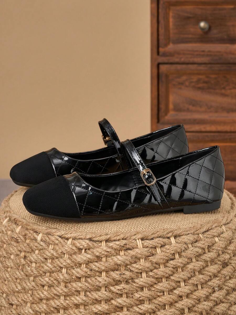 Pair of women's square toe slip-on flat shoes featuring a delicate bow detail and low vamp design.
