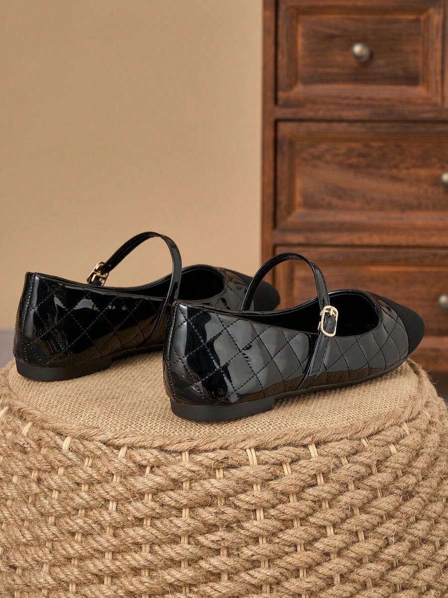 Pair of women's square toe slip-on flat shoes featuring a delicate bow detail and low vamp design.
