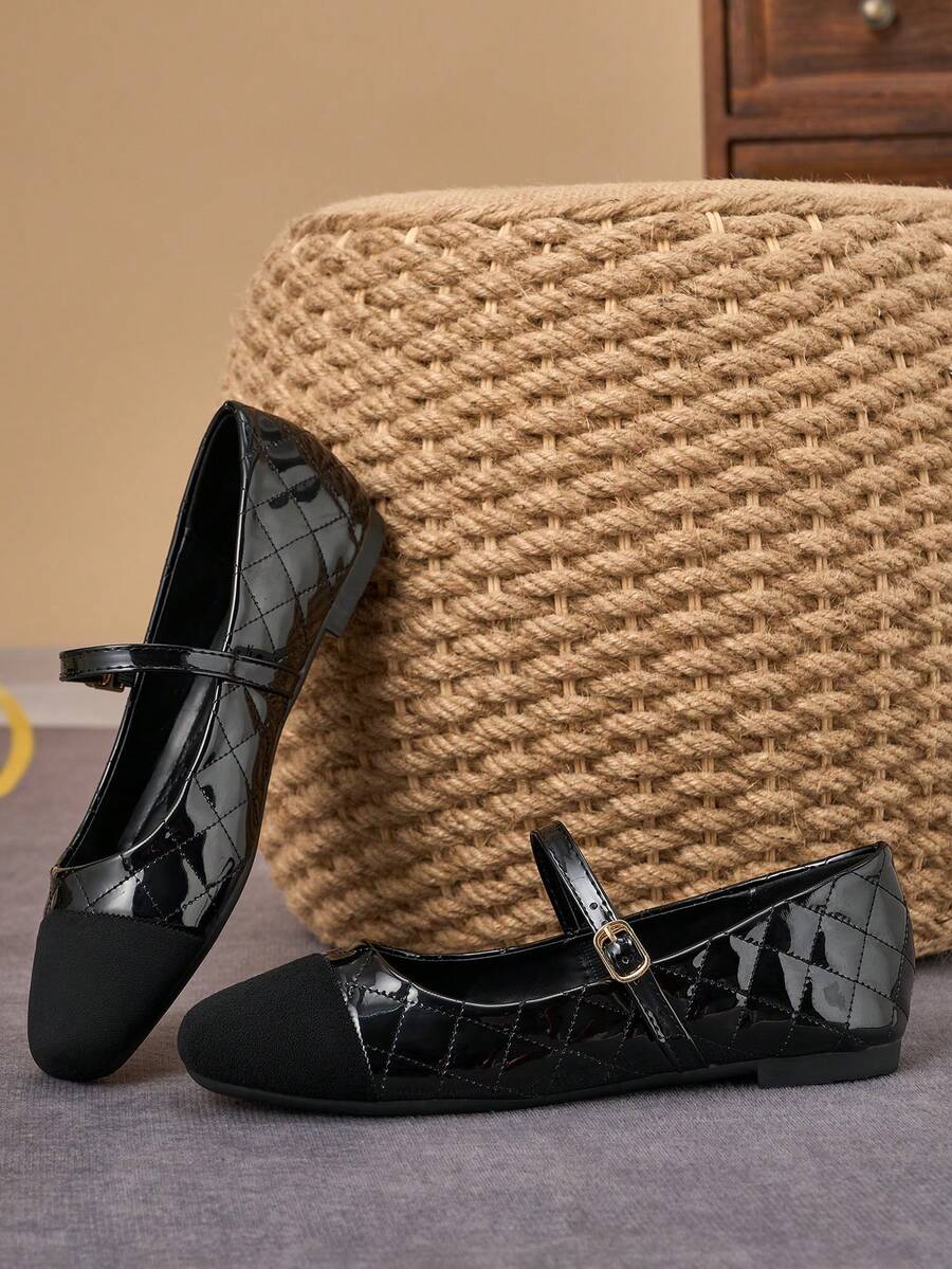 Pair of women's square toe slip-on flat shoes featuring a delicate bow detail and low vamp design.