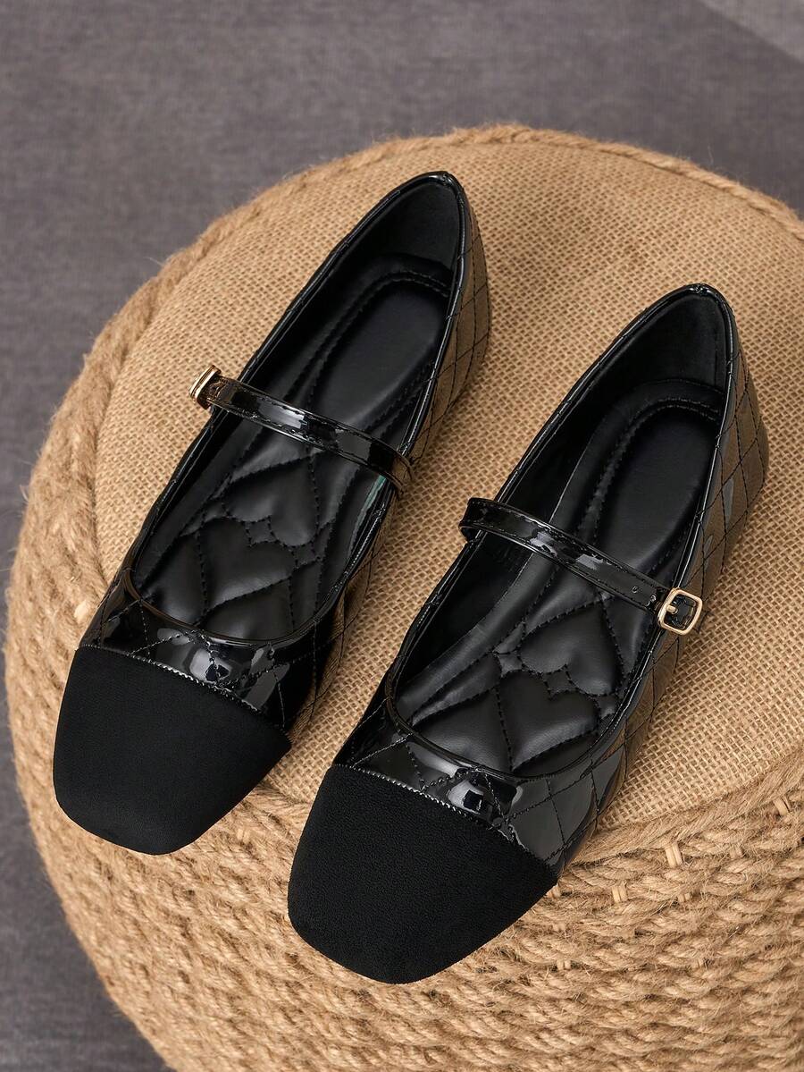 Pair of women's square toe slip-on flat shoes featuring a delicate bow detail and low vamp design.