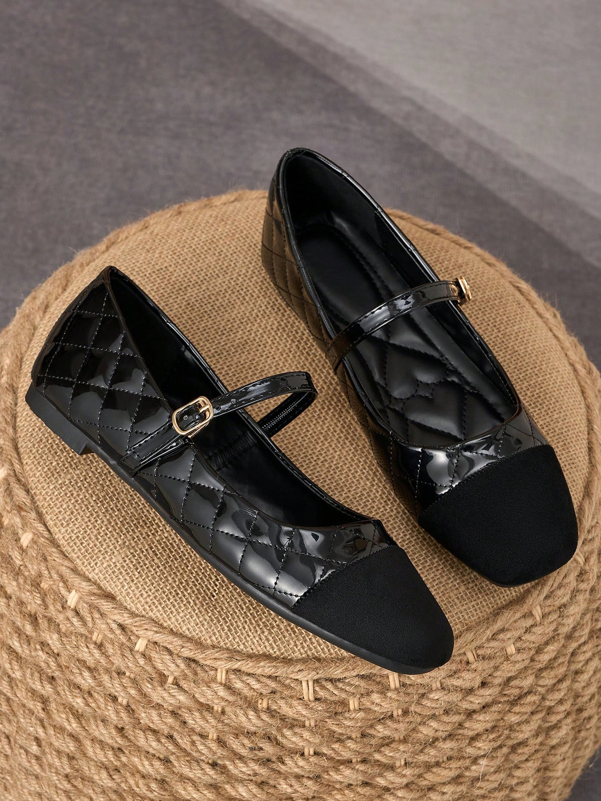 Pair of women's square toe slip-on flat shoes featuring a delicate bow detail and low vamp design.