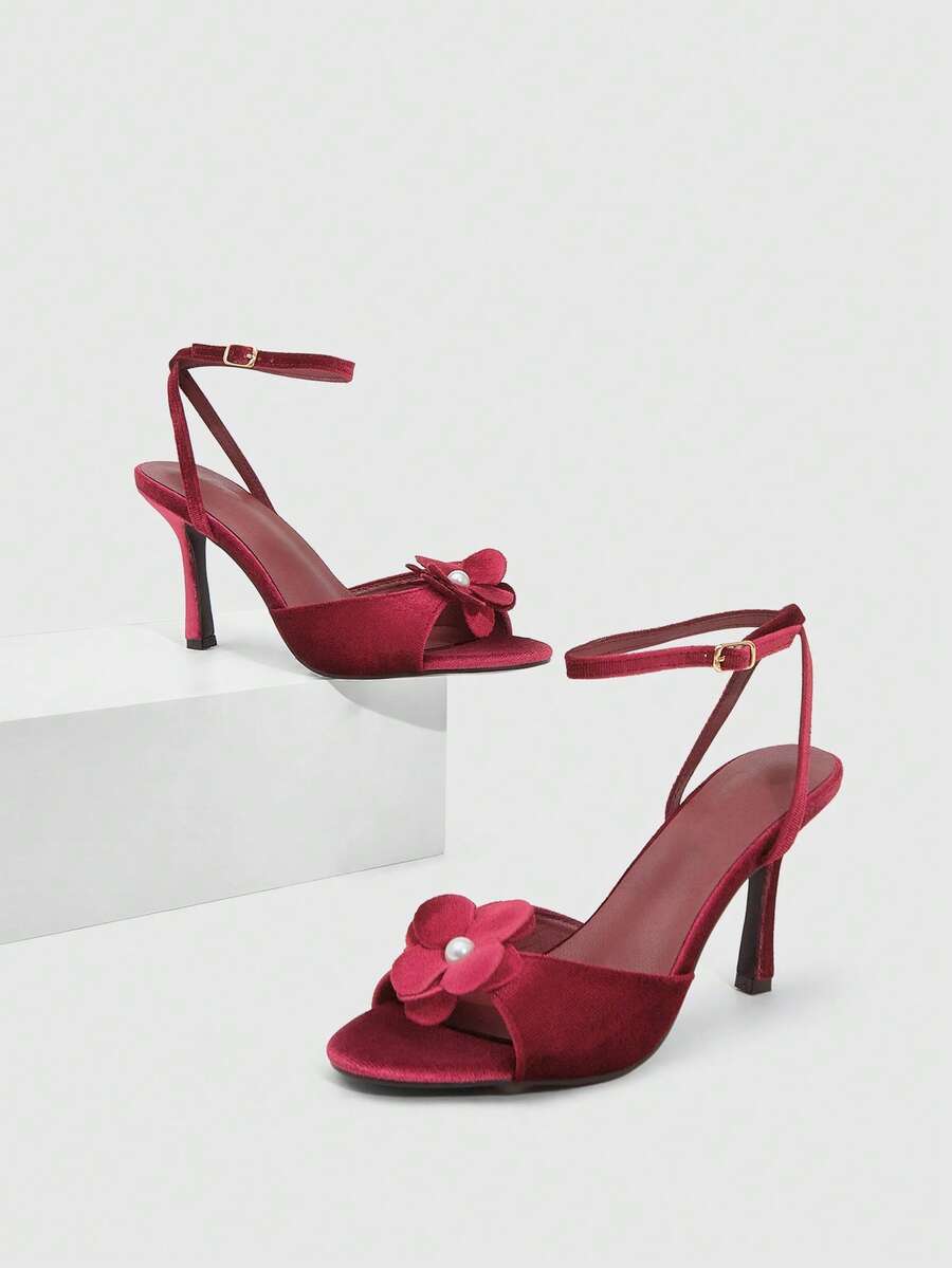 Butterfly high heel sandals featuring crystal embellished ankle straps, open toe design, and sleek stiletto heels for wedding and party wear.