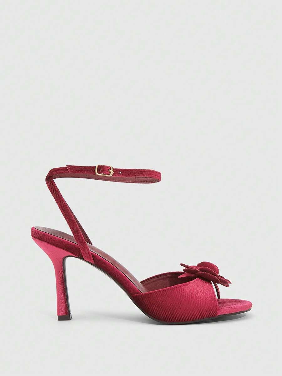 Butterfly high heel sandals featuring crystal embellished ankle straps, open toe design, and sleek stiletto heels for wedding and party wear.