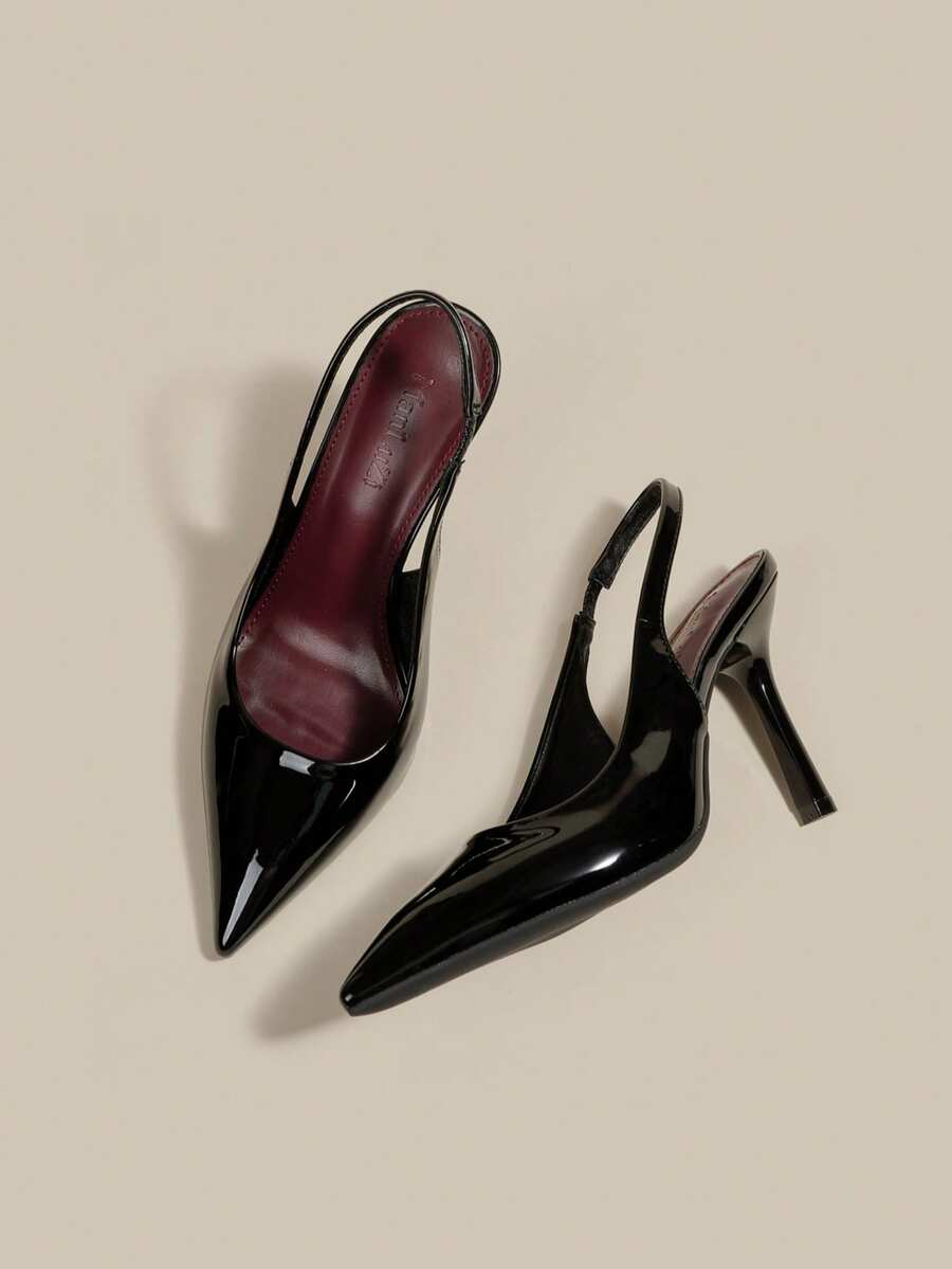 Women's pointed toe kitten heel pumps with adjustable buckle back strap and sleek patent finish.