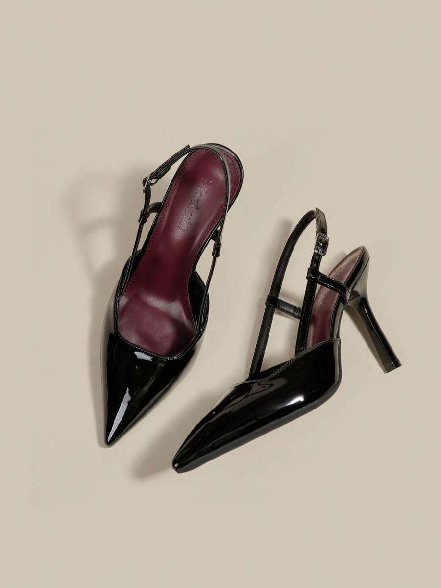 Women's pointed toe kitten heel pumps with adjustable buckle back strap and sleek patent finish.
