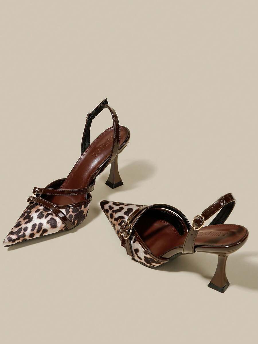 Women's coffee brown patent leather slingback pumps with pointed closed toe and sculpted wine glass high heel.