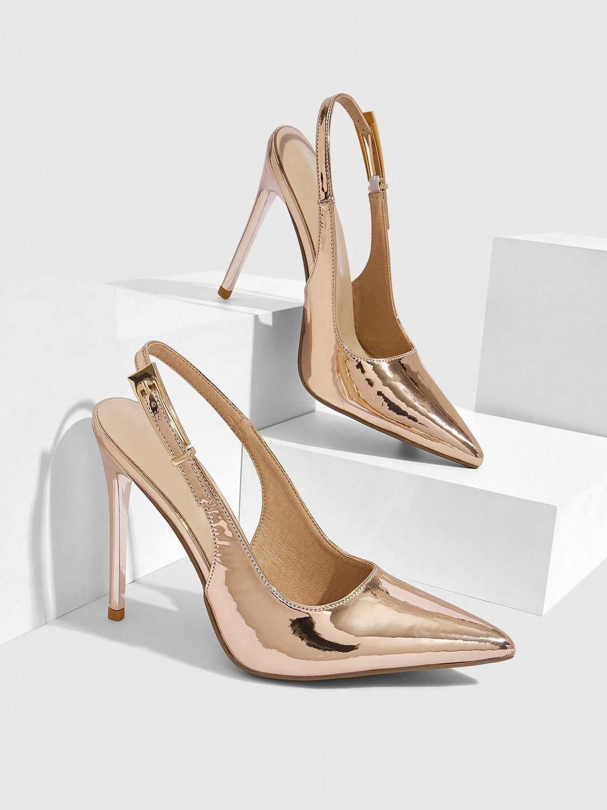 Pointed toe stiletto high heel evening party pumps featuring an ankle strap with buckle closure.