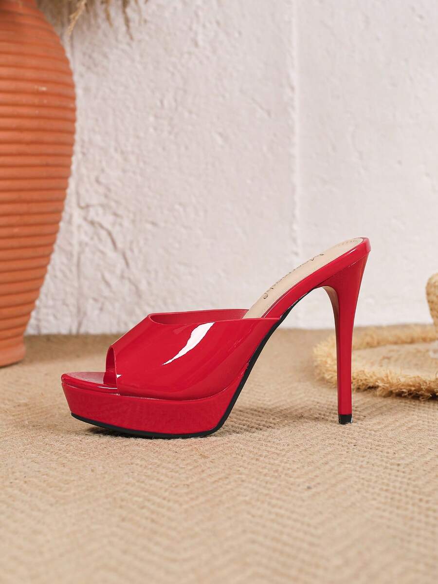 Women's patent leather stiletto heel sandals with open toe ruched slip on mule design.